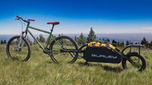 a mountain bike pulling a trailer