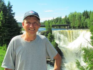 man beside Kakebeka Falls